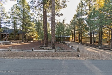 Nestled in the heart of the Pinetop Lakes Country Club, this on Pinetop Lakes Golf and Country Club in Arizona - for sale on GolfHomes.com, golf home, golf lot