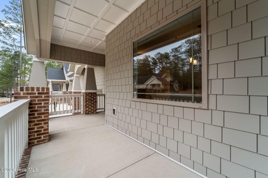 Experience resort-style living in Pinehurst in this on Pinehurst  No. 6 Golf Course in North Carolina - for sale on GolfHomes.com, golf home, golf lot