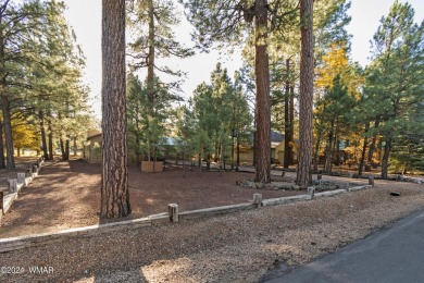 Nestled in the heart of the Pinetop Lakes Country Club, this on Pinetop Lakes Golf and Country Club in Arizona - for sale on GolfHomes.com, golf home, golf lot