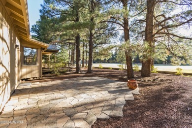 Nestled in the heart of the Pinetop Lakes Country Club, this on Pinetop Lakes Golf and Country Club in Arizona - for sale on GolfHomes.com, golf home, golf lot