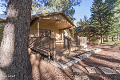 Nestled in the heart of the Pinetop Lakes Country Club, this on Pinetop Lakes Golf and Country Club in Arizona - for sale on GolfHomes.com, golf home, golf lot