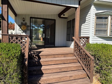 Oversized lot with park trailer, septic, room addition, deck on Captains Cove Golf and Yacht Club in Virginia - for sale on GolfHomes.com, golf home, golf lot