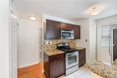 Welcome to Alpharetta condo living at its best with ZERO RENT on Rivermont Golf and Country Club in Georgia - for sale on GolfHomes.com, golf home, golf lot