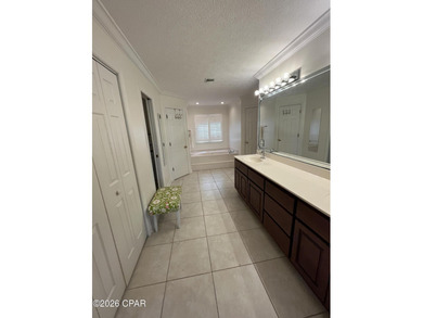 CURRENTLY UNDER CONTRACT, SELLER WILL CONSIDER BACK UP OFFERS on Panama Country Club in Florida - for sale on GolfHomes.com, golf home, golf lot