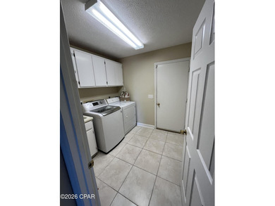 CURRENTLY UNDER CONTRACT, SELLER WILL CONSIDER BACK UP OFFERS on Panama Country Club in Florida - for sale on GolfHomes.com, golf home, golf lot