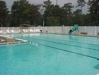 Oversized lot with park trailer, septic, room addition, deck on Captains Cove Golf and Yacht Club in Virginia - for sale on GolfHomes.com, golf home, golf lot