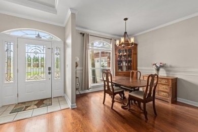 Step right up to this four-bedroom, three-bathroom gem nestled on Emerald Bay Golf Club in Florida - for sale on GolfHomes.com, golf home, golf lot