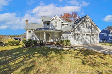 Waterfront home with stunning views located in the gated and on Carolina Trace Country Club in North Carolina - for sale on GolfHomes.com, golf home, golf lot