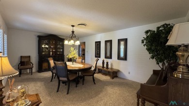 Would you like to live close to the golf course where you can on Lovington Country Club in New Mexico - for sale on GolfHomes.com, golf home, golf lot