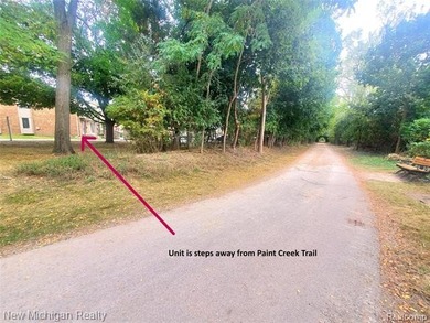 Beautifully updated end-unit brick condo in the highly desirable on Great Oaks Country Club in Michigan - for sale on GolfHomes.com, golf home, golf lot