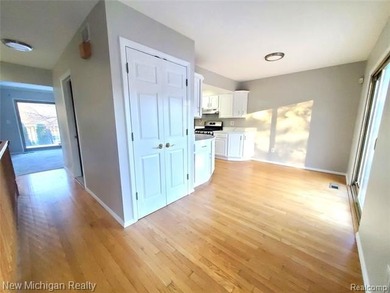 Beautifully updated end-unit brick condo in the highly desirable on Great Oaks Country Club in Michigan - for sale on GolfHomes.com, golf home, golf lot