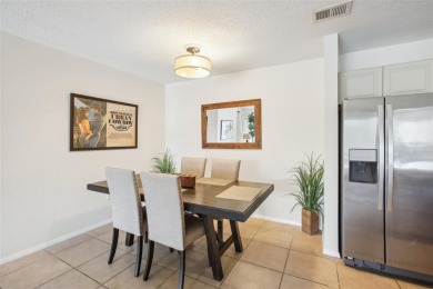 EXCEPTIONAL 2-bedroom, 2-bathroom condo, nestled within the on Hunters Green Country Club in Florida - for sale on GolfHomes.com, golf home, golf lot