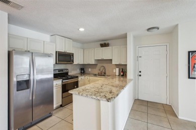 EXCEPTIONAL 2-bedroom, 2-bathroom condo, nestled within the on Hunters Green Country Club in Florida - for sale on GolfHomes.com, golf home, golf lot