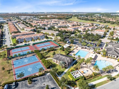 Welcome to this spacious end-unit townhome in the guard-gated on Eagle Creek Golf Club in Florida - for sale on GolfHomes.com, golf home, golf lot