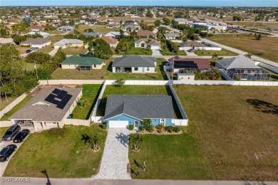 Experience this Updated, Charming home in SW Cape Coral--Priced on Palmetto-Pine Country Club in Florida - for sale on GolfHomes.com, golf home, golf lot