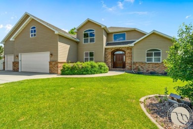 Luxury living meets golf course serenity at 2240 Saddleback in on Laurel Golf Club in Montana - for sale on GolfHomes.com, golf home, golf lot