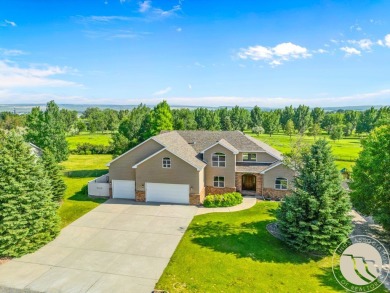 Luxury living meets golf course serenity at 2240 Saddleback in on Laurel Golf Club in Montana - for sale on GolfHomes.com, golf home, golf lot