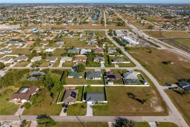 Experience this Updated, Charming home in SW Cape Coral--Priced on Palmetto-Pine Country Club in Florida - for sale on GolfHomes.com, golf home, golf lot