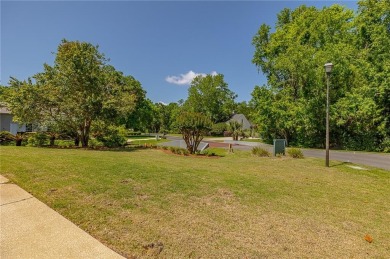 This beautifully crafted tabby ranch offers peaceful lagoon and on Sea Palms Golf and Tennis Resort in Georgia - for sale on GolfHomes.com, golf home, golf lot