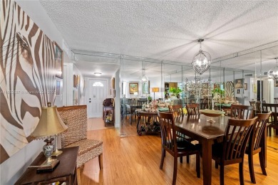 This beautifully renovated 2-bedroom, 2-bathroom condo in the on Sunrise Lakes Phase III in Florida - for sale on GolfHomes.com, golf home, golf lot