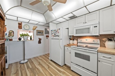 This beautifully renovated 2-bedroom, 2-bathroom condo in the on Sunrise Lakes Phase III in Florida - for sale on GolfHomes.com, golf home, golf lot