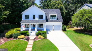 Welcome to this exquisite John Weiland-designed estate, where on Reunion Golf Club in Georgia - for sale on GolfHomes.com, golf home, golf lot
