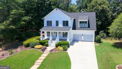 Welcome to this exquisite John Weiland-designed estate, where on Reunion Golf Club in Georgia - for sale on GolfHomes.com, golf home, golf lot