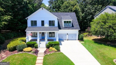 Welcome to this exquisite John Weiland-designed estate, where on Reunion Golf Club in Georgia - for sale on GolfHomes.com, golf home, golf lot