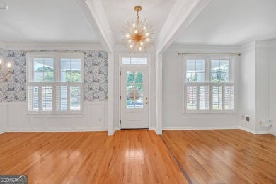 Welcome to this exquisite John Weiland-designed estate, where on Reunion Golf Club in Georgia - for sale on GolfHomes.com, golf home, golf lot