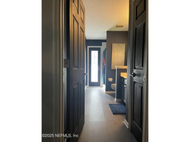 Nestled in the sought-after Southern Links community of Fleming on Golf Club At Fleming Island in Florida - for sale on GolfHomes.com, golf home, golf lot