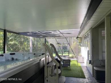 Nestled in the sought-after Southern Links community of Fleming on Golf Club At Fleming Island in Florida - for sale on GolfHomes.com, golf home, golf lot