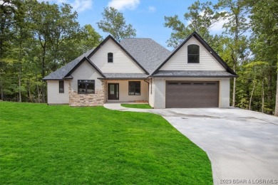 NEW CONSTRUCTION! Stunning 5-bedroom 2and a half bath home in on The Club At Porto Cima in Missouri - for sale on GolfHomes.com, golf home, golf lot