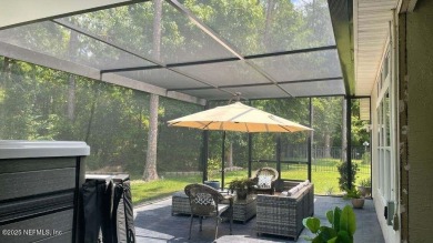 Nestled in the sought-after Southern Links community of Fleming on Golf Club At Fleming Island in Florida - for sale on GolfHomes.com, golf home, golf lot