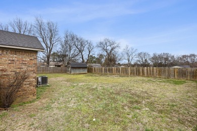 THIS HOME IS CLOSE TO SCHOOLS, IN THE HEART OF POTTVILLE WITH on Galla Creek Golf Course in Arkansas - for sale on GolfHomes.com, golf home, golf lot