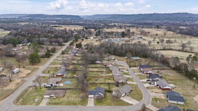 THIS HOME IS CLOSE TO SCHOOLS, IN THE HEART OF POTTVILLE WITH on Galla Creek Golf Course in Arkansas - for sale on GolfHomes.com, golf home, golf lot