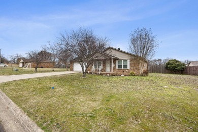 THIS HOME IS CLOSE TO SCHOOLS, IN THE HEART OF POTTVILLE WITH on Galla Creek Golf Course in Arkansas - for sale on GolfHomes.com, golf home, golf lot