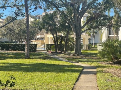 Spacious 3 bedroom, 2 bath split plan condo in a desirable on East Bay Golf Club in Florida - for sale on GolfHomes.com, golf home, golf lot