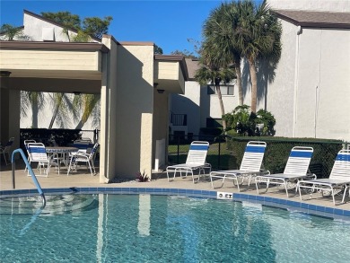 Spacious 3 bedroom, 2 bath split plan condo in a desirable on East Bay Golf Club in Florida - for sale on GolfHomes.com, golf home, golf lot