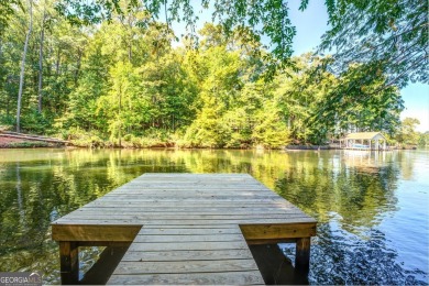 Completely renovated waterfront ranch home with a fully finished on Turtle Cove Golf Course in Georgia - for sale on GolfHomes.com, golf home, golf lot