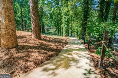 Completely renovated waterfront ranch home with a fully finished on Turtle Cove Golf Course in Georgia - for sale on GolfHomes.com, golf home, golf lot