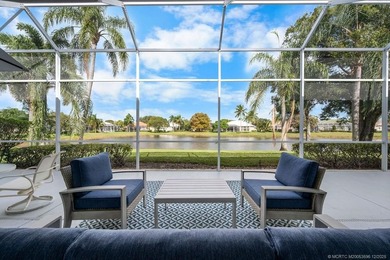 Embrace this beautiful crisp clean home with a harmonious on Monarch Country Club in Florida - for sale on GolfHomes.com, golf home, golf lot