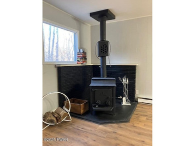 Your next chapter starts here!  Keep warm inside by a roaring on Forest Lake Club in Pennsylvania - for sale on GolfHomes.com, golf home, golf lot