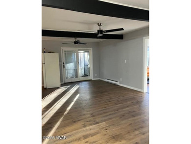 Your next chapter starts here!  Keep warm inside by a roaring on Forest Lake Club in Pennsylvania - for sale on GolfHomes.com, golf home, golf lot