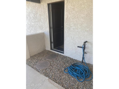 This home has been updated with a new heat pump AC conditioner on London Bridge Golf Course in Arizona - for sale on GolfHomes.com, golf home, golf lot