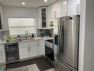 WELL KEPT CONDO WITH UPGRADED KITCHEN WITH QUARTZ COUNTERTOPS on Sunrise Lakes Phase III in Florida - for sale on GolfHomes.com, golf home, golf lot