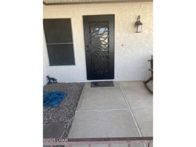 This home has been updated with a new heat pump AC conditioner on London Bridge Golf Course in Arizona - for sale on GolfHomes.com, golf home, golf lot