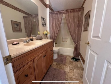 Bond Paid! Motivated Sellers! Move-In Ready Courtyard Villa in on El Diablo Executive Golf Course in Florida - for sale on GolfHomes.com, golf home, golf lot