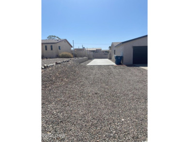 This home has been updated with a new heat pump AC conditioner on London Bridge Golf Course in Arizona - for sale on GolfHomes.com, golf home, golf lot