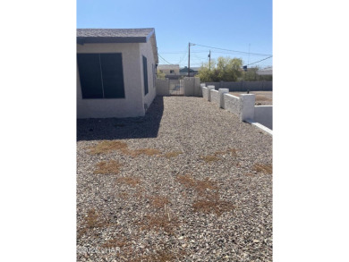 This home has been updated with a new heat pump AC conditioner on London Bridge Golf Course in Arizona - for sale on GolfHomes.com, golf home, golf lot