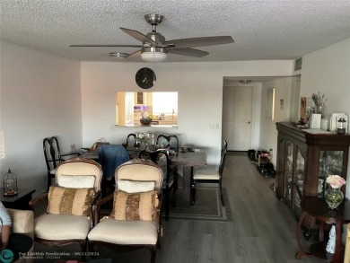 WELL KEPT CONDO WITH UPGRADED KITCHEN WITH QUARTZ COUNTERTOPS on Sunrise Lakes Phase III in Florida - for sale on GolfHomes.com, golf home, golf lot